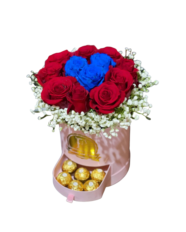 Red and Blue Ecuadorian Roses in Pink Bucket